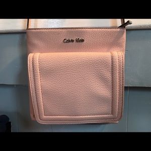 Calvin Klein genuine leather.